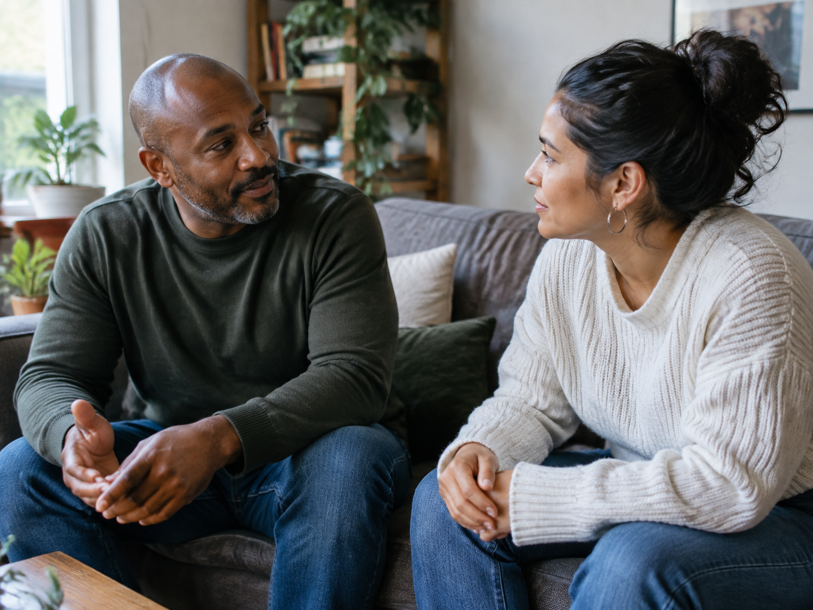 A couple having an honest conversation together at home