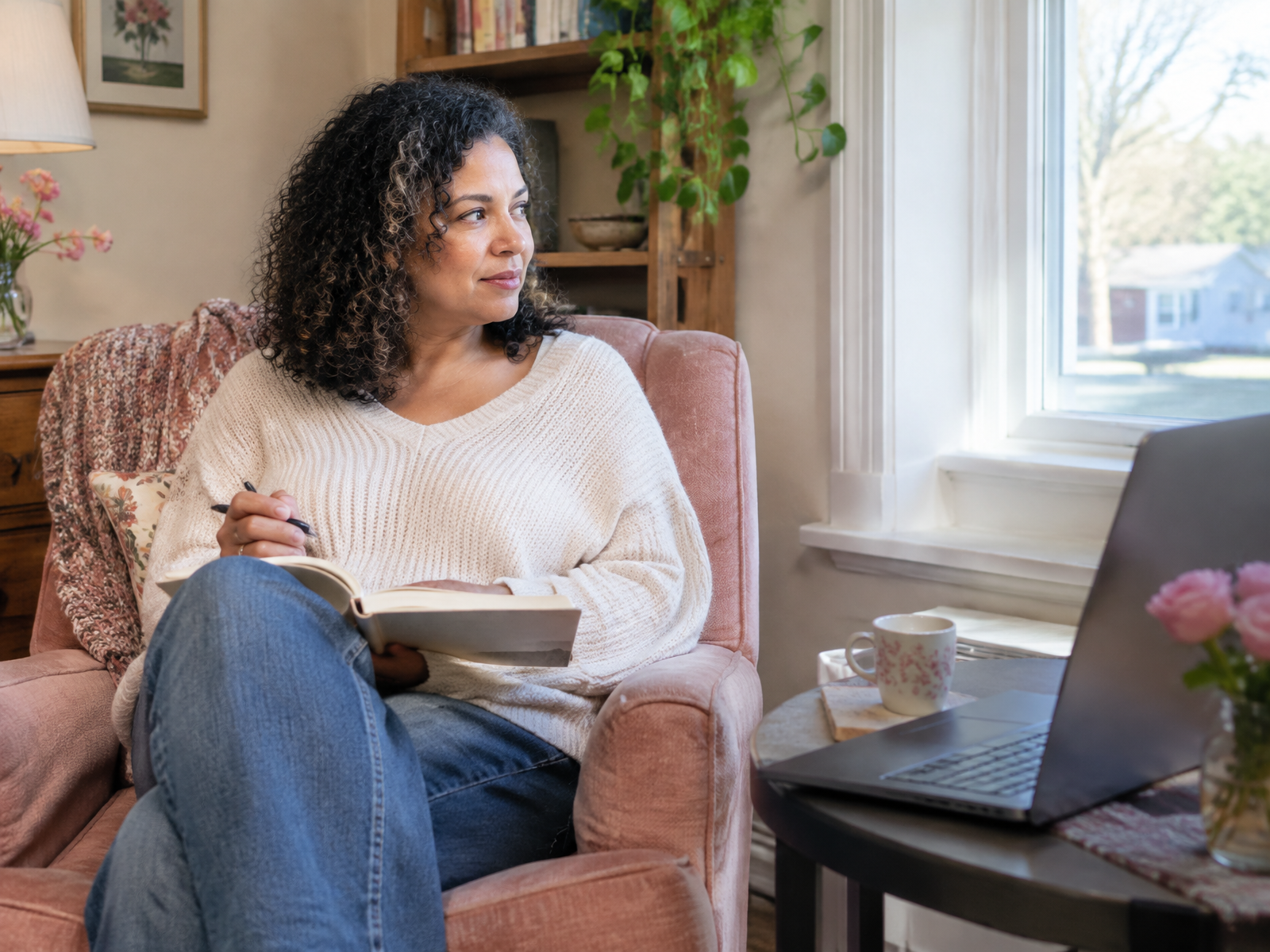 A woman settling into a private room before her first telehealth therapy session